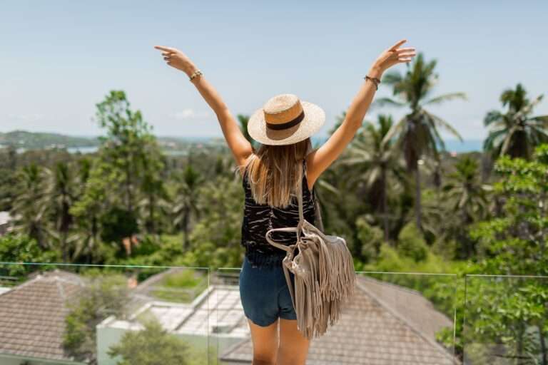 view-from-back-traveling-woman-straw-hat-enjoying-amazing-tropical-landscape